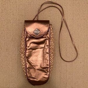 Cashew New York copper color and cheetah print bag